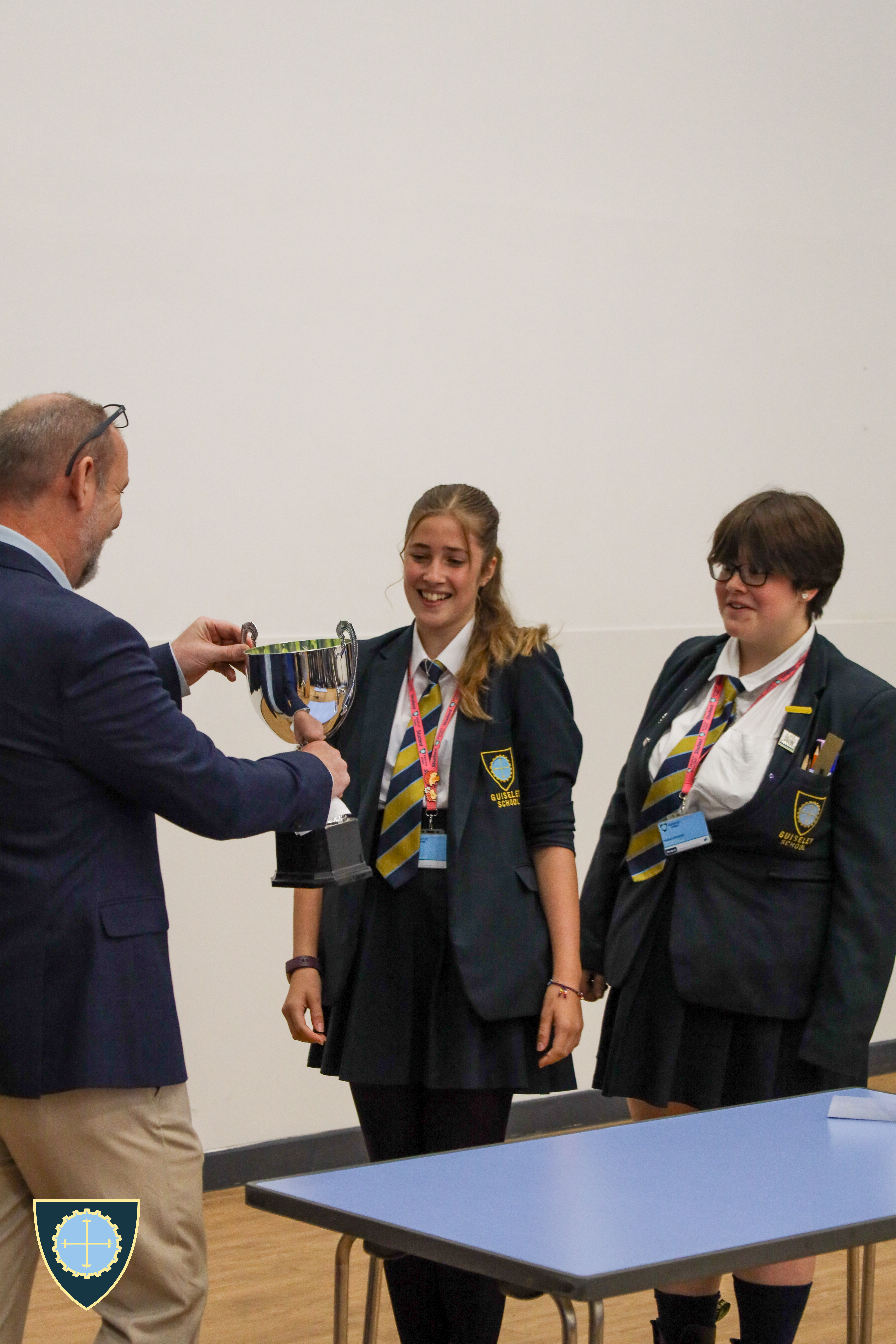 Last Years House Cup Winners, Omega, being awarded their trophy by Mr Clayton